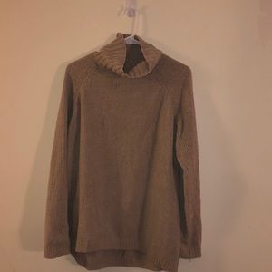 Tan oversized turtleneck sweater